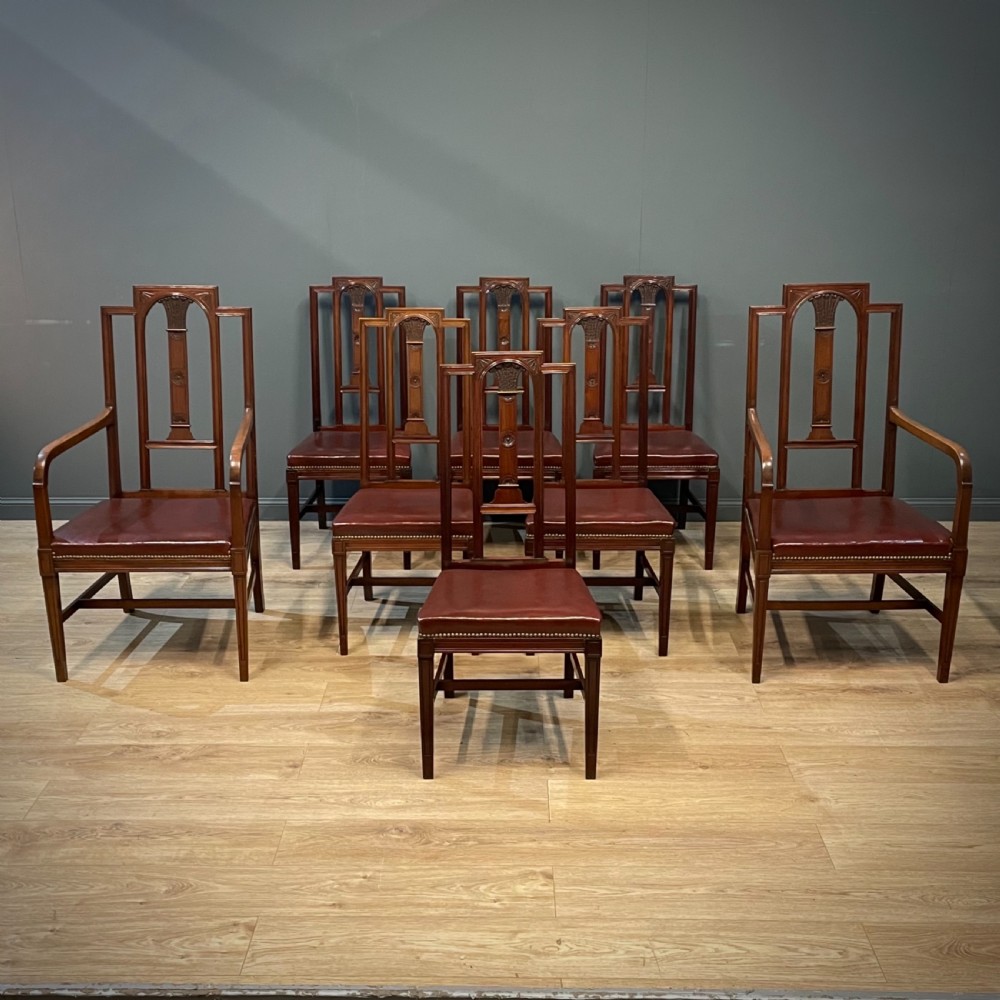 attractive set of eight antique carved mahogany leather dining chairs
