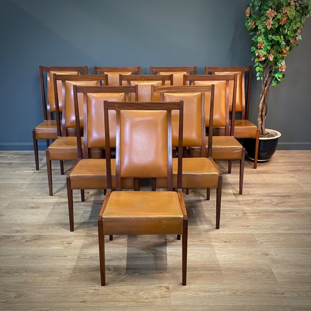 attractive set of ten vintage large teak and brown leather dining chairs