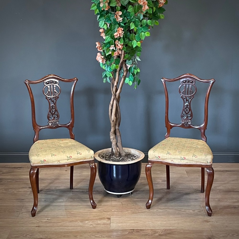 attractive pair of antique edwardian carved mahogany dining chairs