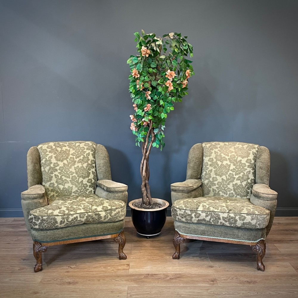 attractive large pair of upholstered green wing back fireside heavy armchairs