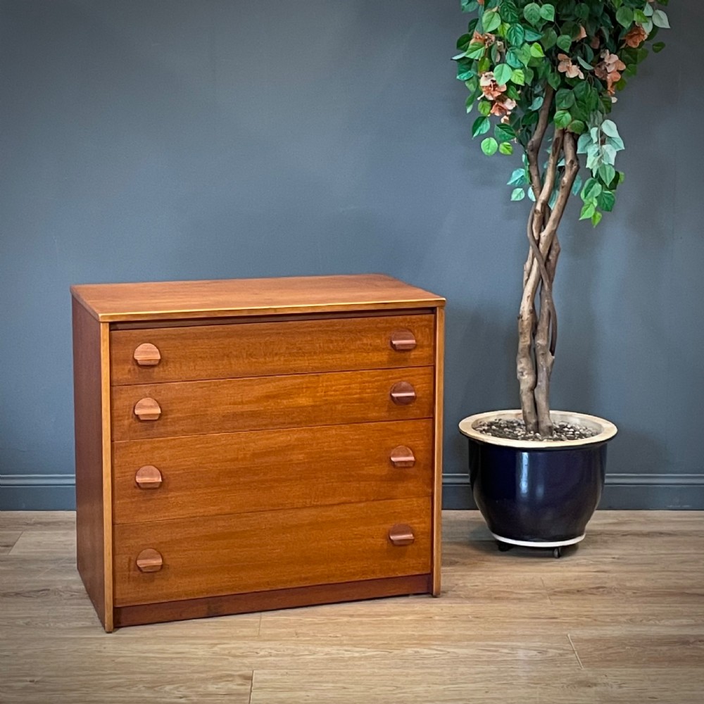 attractive vintage 6070s small stag teak chest of four drawers