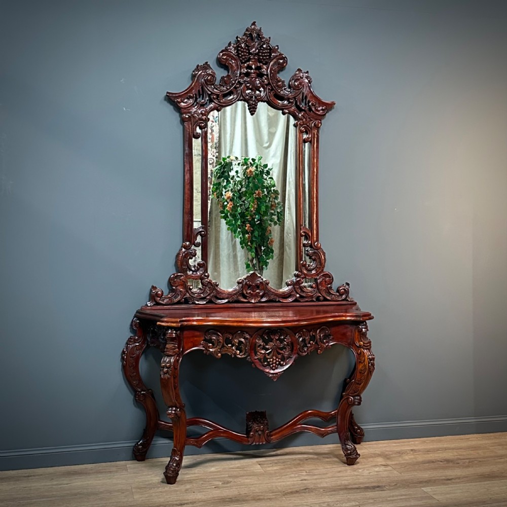 attractive large antique style ornately carved console table and tall mirror