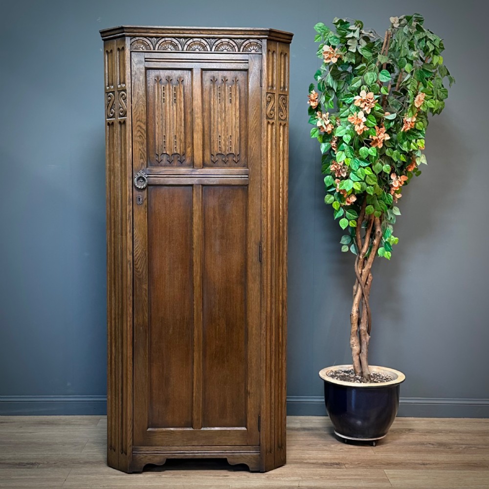 attractive vintage slender corner carved oak hall cupboard wardrobe