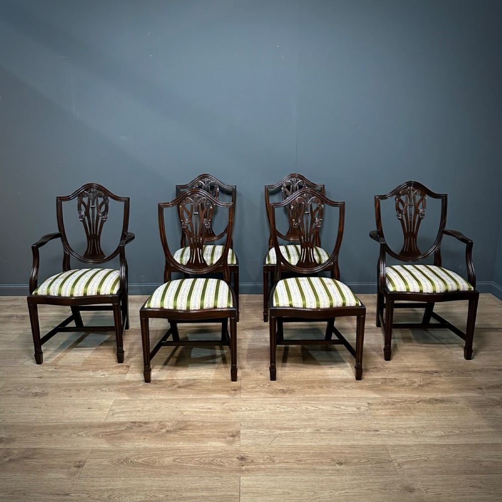 six attractive vintage mahogany fleurdelys shieldback dining chairs carvers