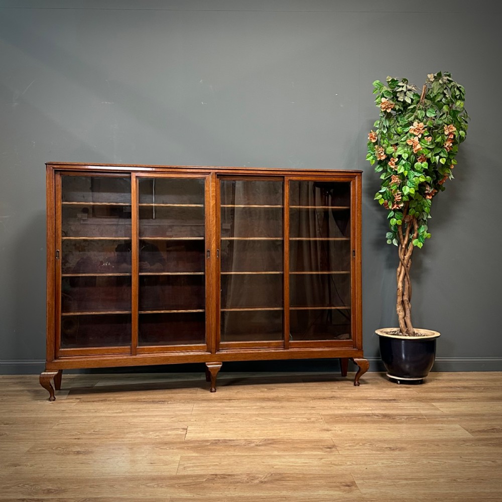 attractive large wide antique mahogany glazed floor bookcase