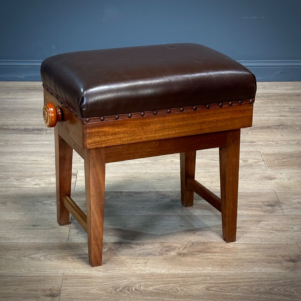 attractive art deco mahogany adjustable piano stool upholstered in vinyl