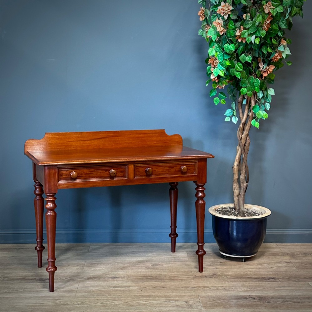 attractive antique victorian mahogany side table with drawers