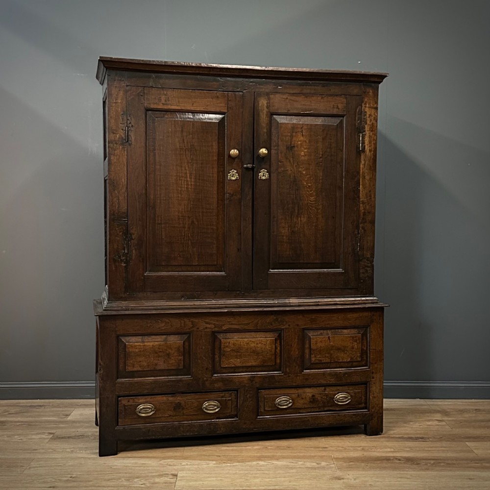attractive large rustic antique 18th century oak tack cupboard with drawers