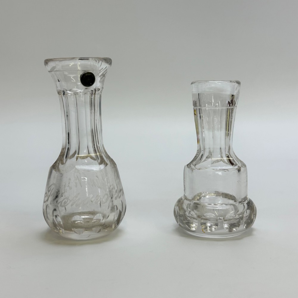 pair of antique crystal spirit measures including one victorian richards patent