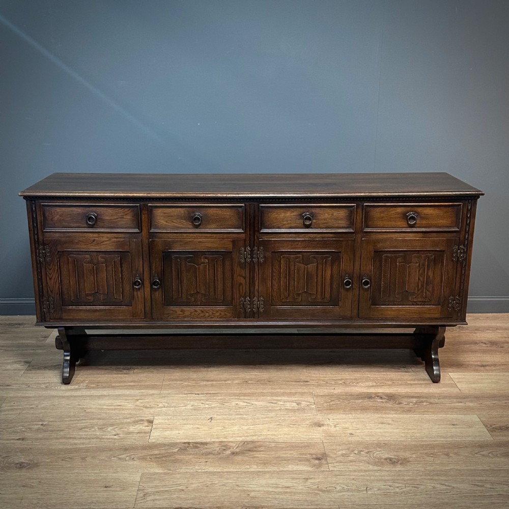 attractive large carved oak sideboard cabinet