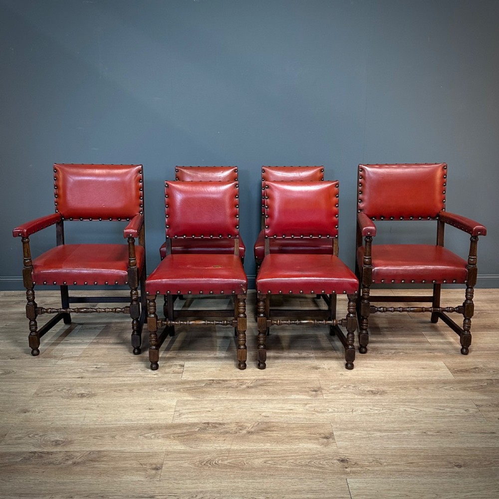 attractive set of six oak and leather dining chairs with carvers for reupholstery