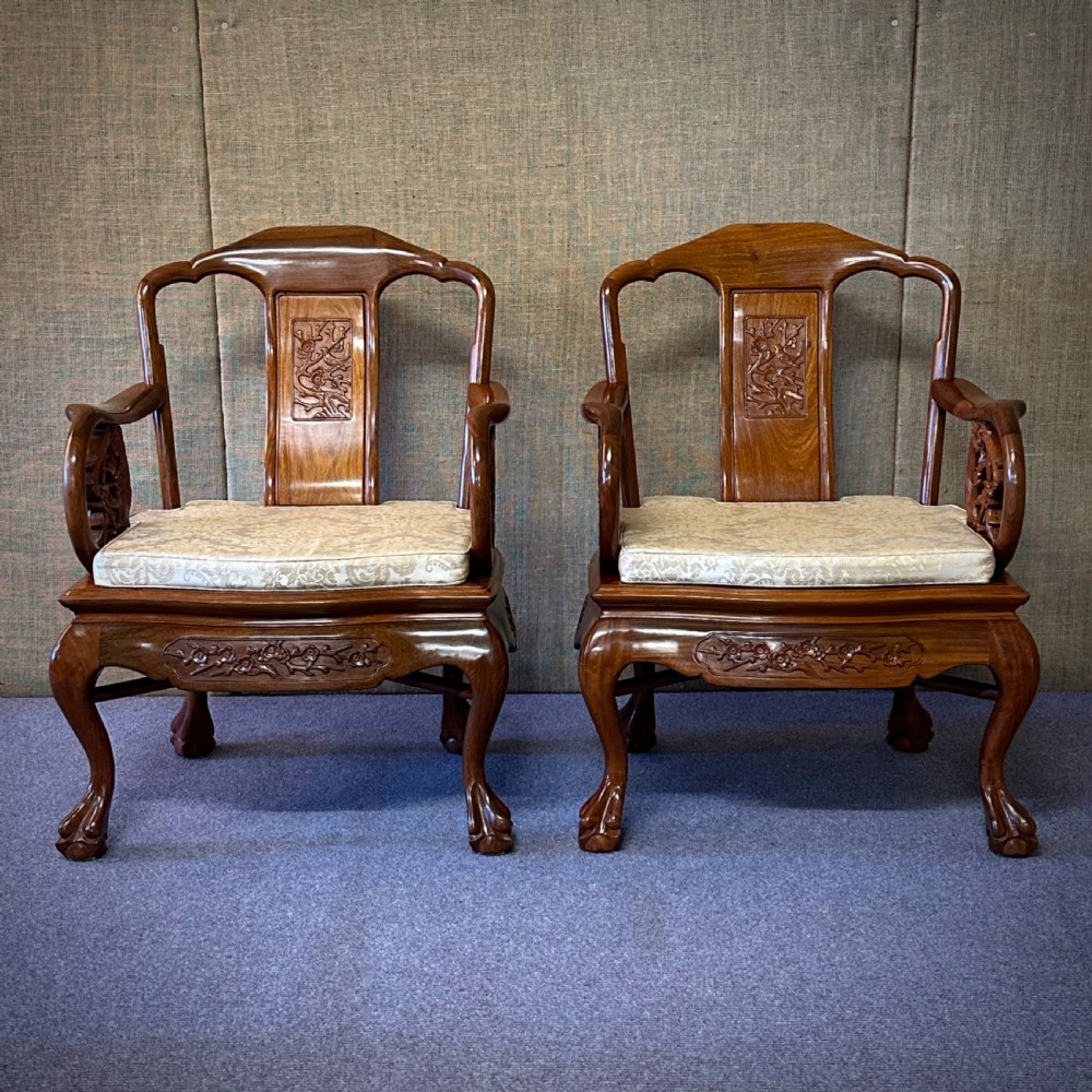 lovely pair of carved cherrywood oriental ornate heavy armchairs