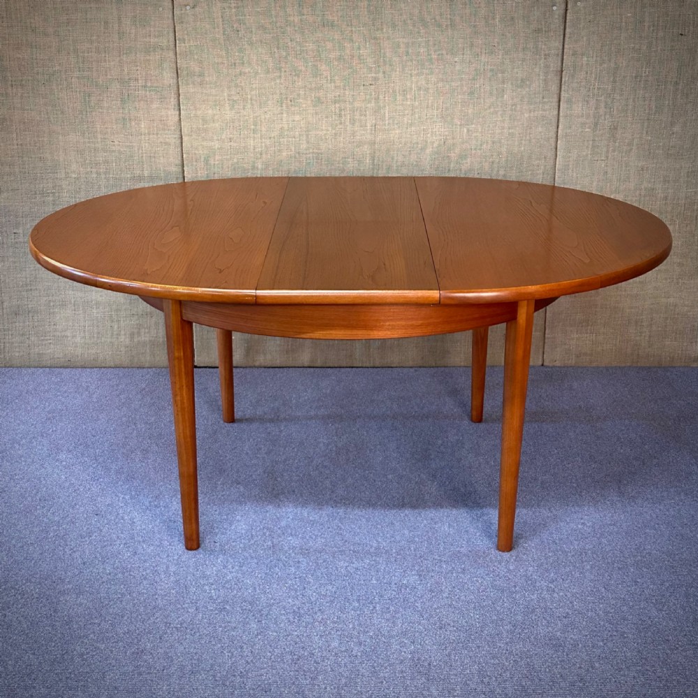 attractive large mid century teak circular extending dining table