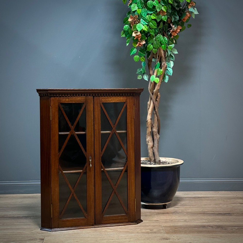 attractive small antique mahogany wall hanging glazed corner cabinet