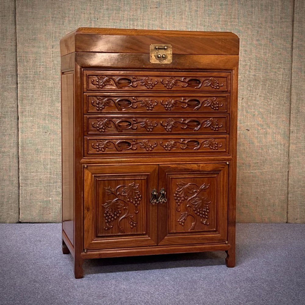 attractive oriental carved cherrywood cutlery cabinet collectors chest