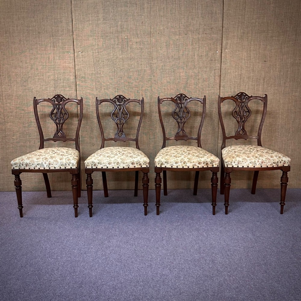 set of four antique edwardian carved mahogany upholstered dining chairs