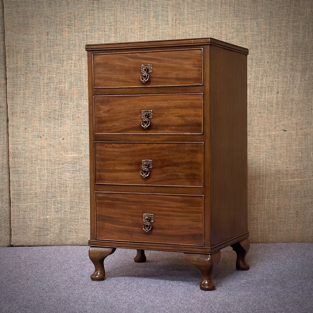 attractive vintage small mahogany bedside chest of four graduated drawers