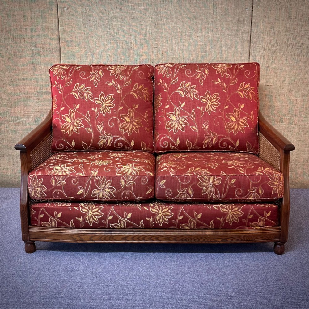 attractive ercol bergere red and gold upholstered two seater settee