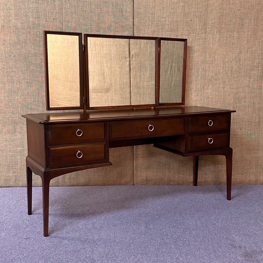 attractive stag minstrel five drawer triple mirror dressing table