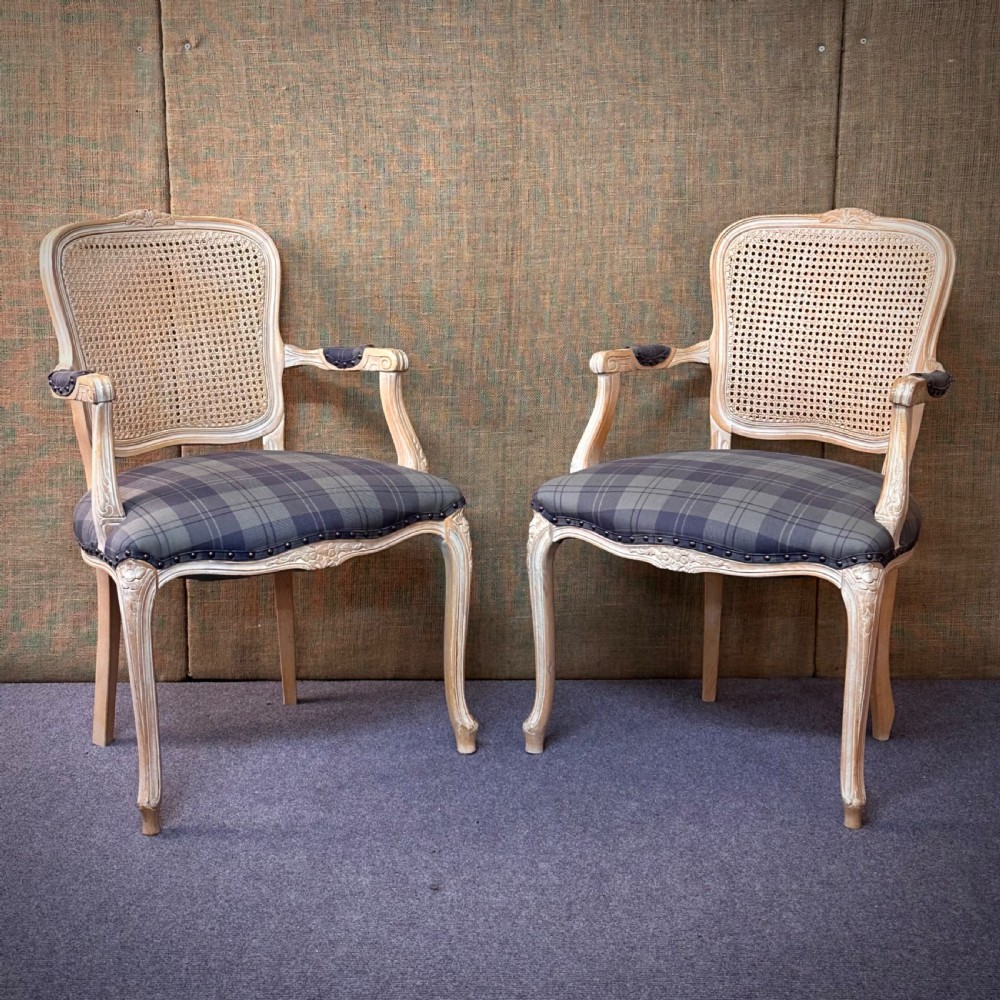 attractive pair of french carved fauteuil style open bergere armchairs