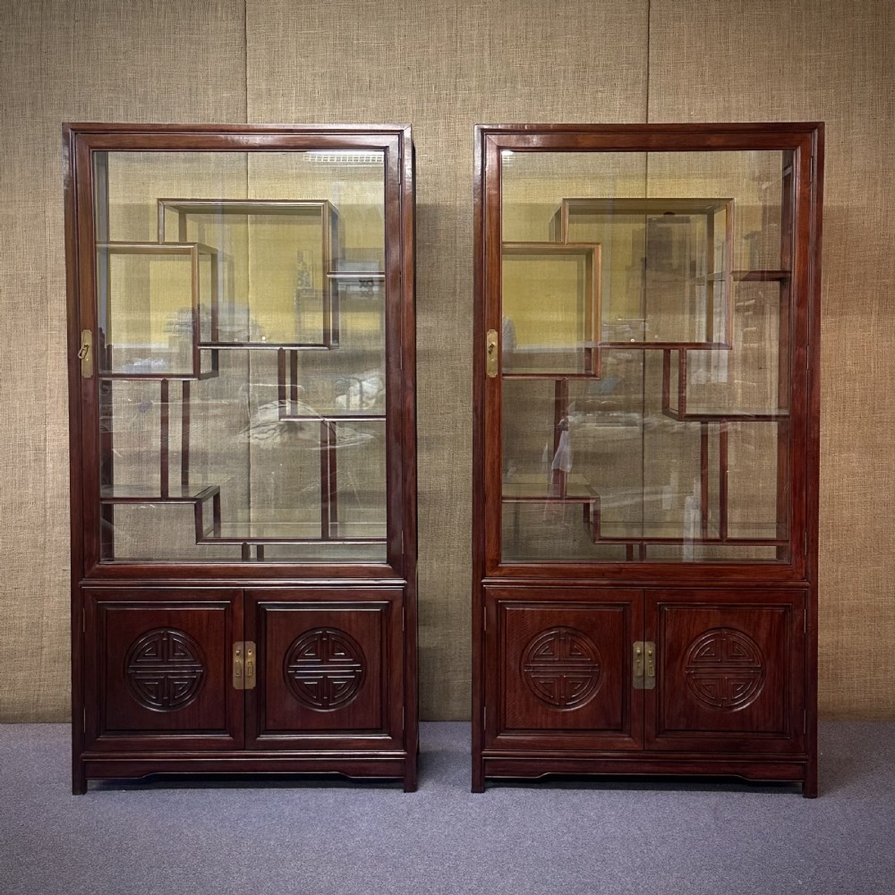 attractive pair of large oriental cherrywood display curio cabinets