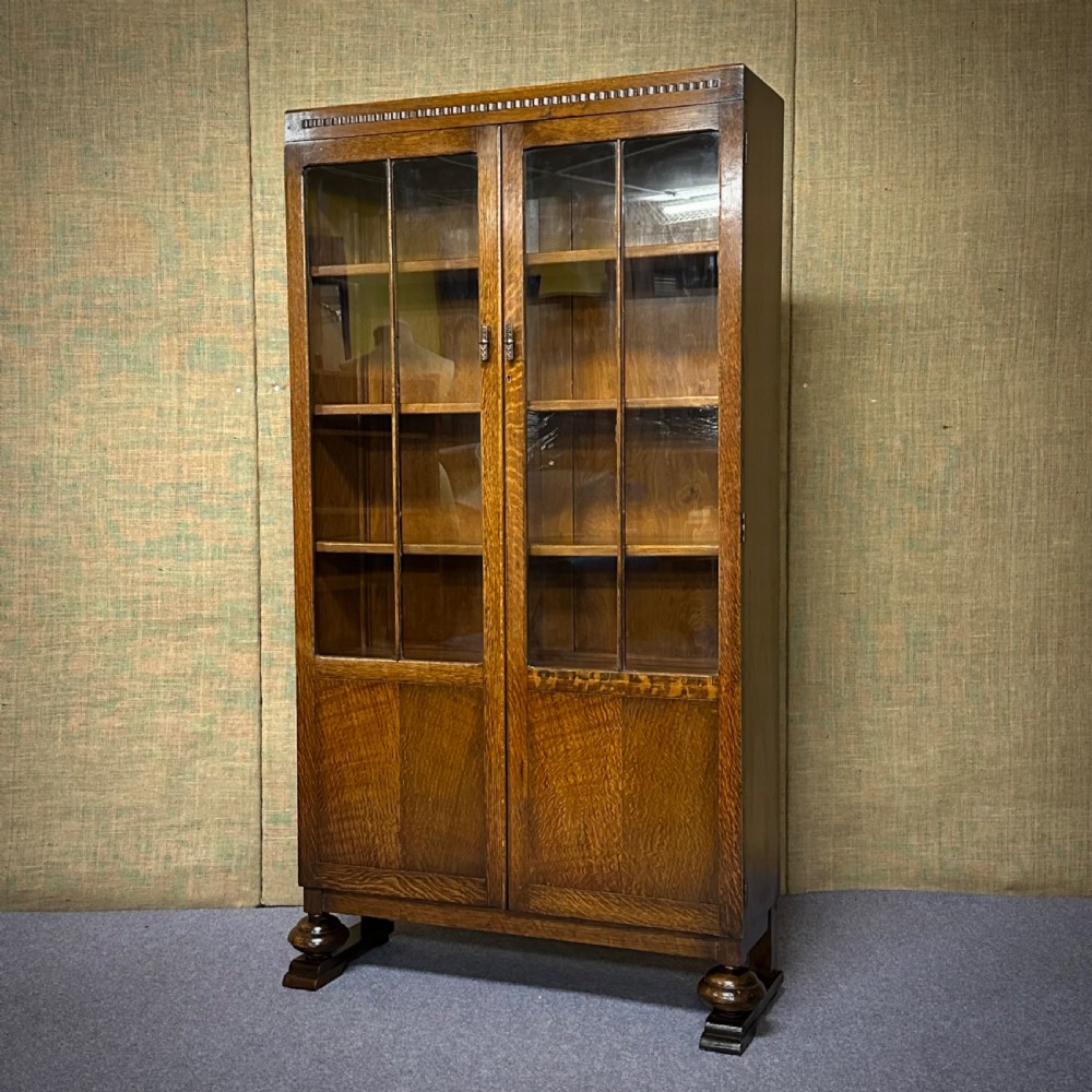 attractive large antique oak glazed two door bookcase cabinet