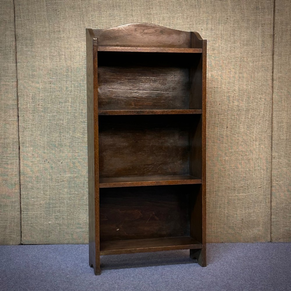 attractive small antique slender open oak bookcase